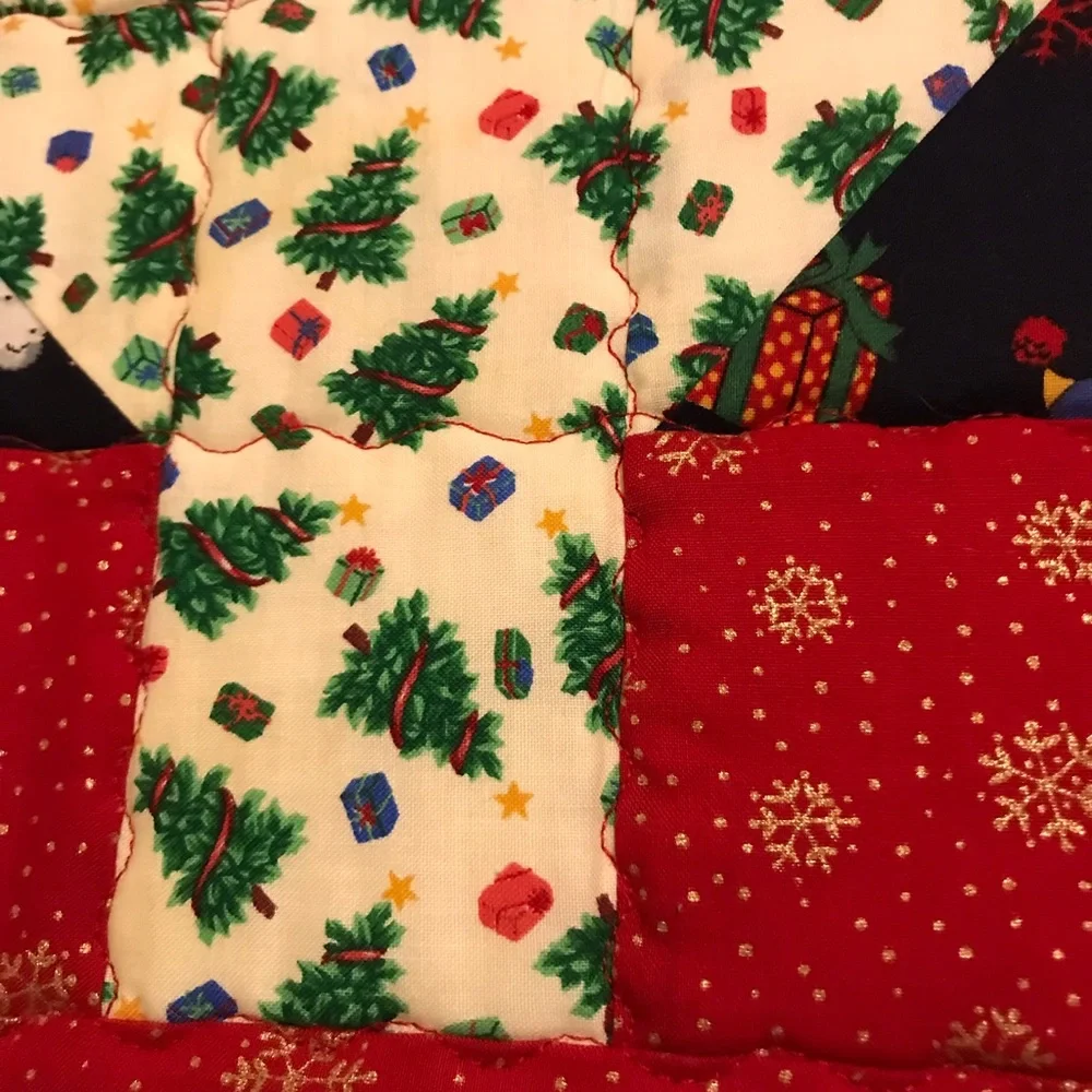 Handcrafted a quilted reversible table runner. Lots of stitching detail
